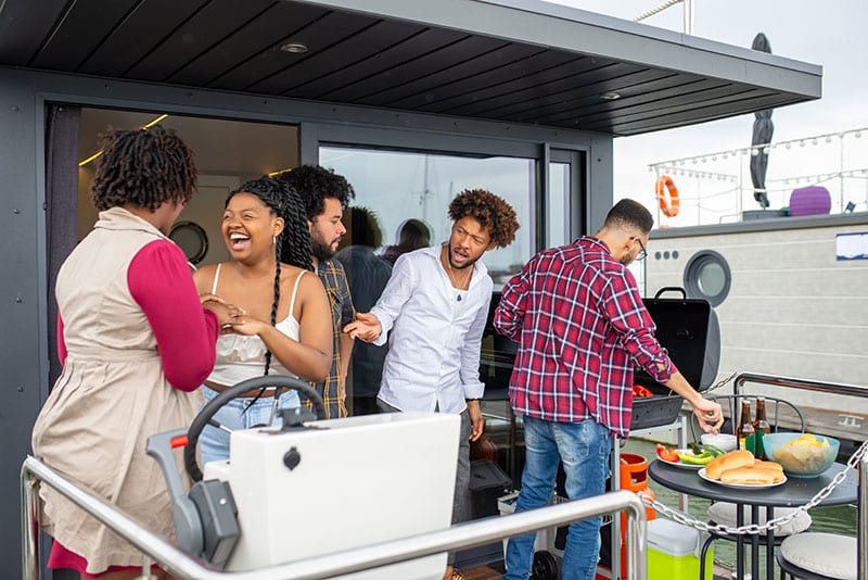 adults at a BBQ outdoor, having fun